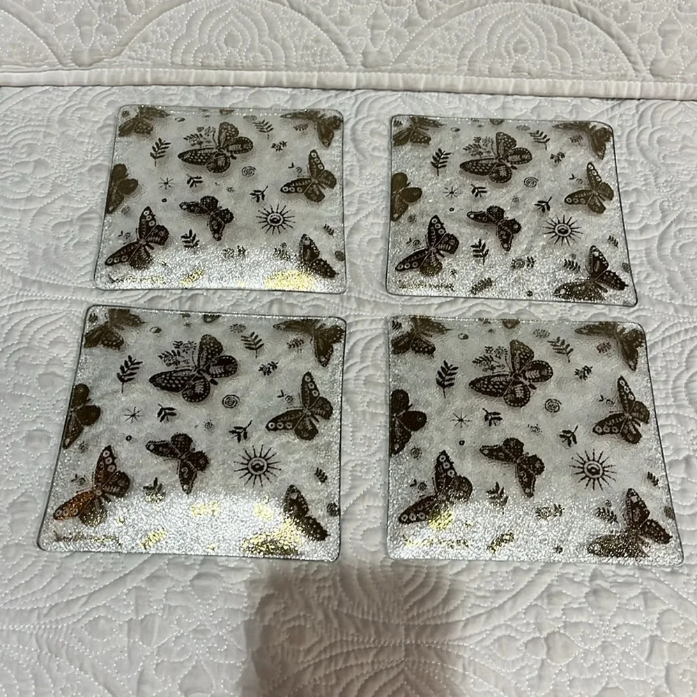 Set of four Georges‎ Briard square plates